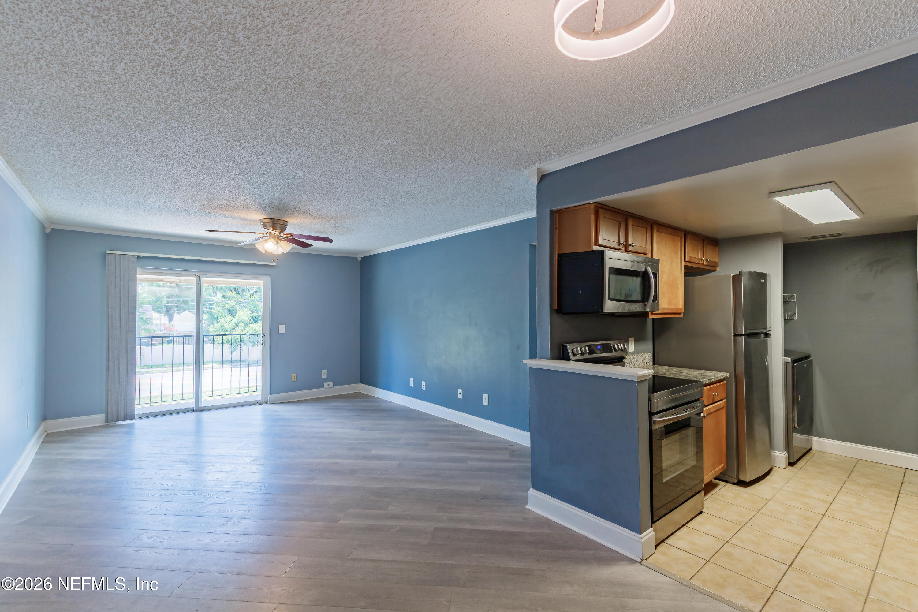 3737 Loretto Road, Unit 905 Jacksonville, FL 32223 - Photo 12 of 28 Dining Room to Living Room