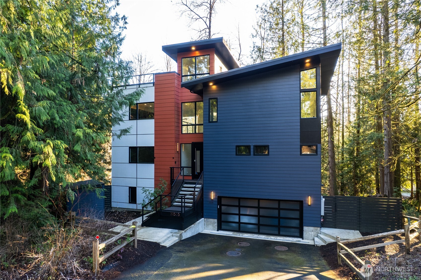 31535 Northeast 114th Street Carnation, WA 98014 - Photo 1 of 33 a front view of a house with garden