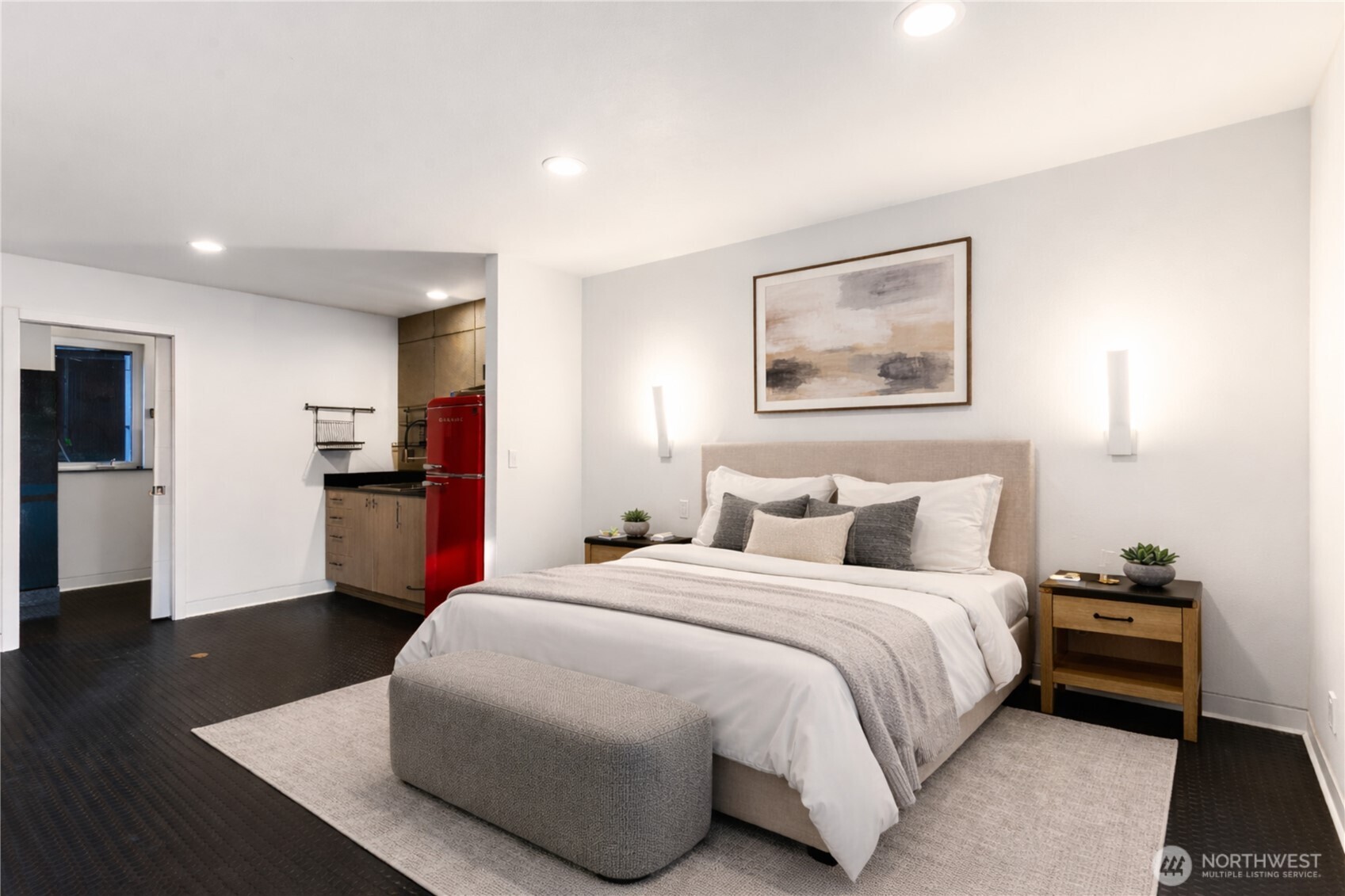 31535 Northeast 114th Street Carnation, WA 98014 - Photo 19 of 33 a spacious bedroom with a bed and a view of kitchen