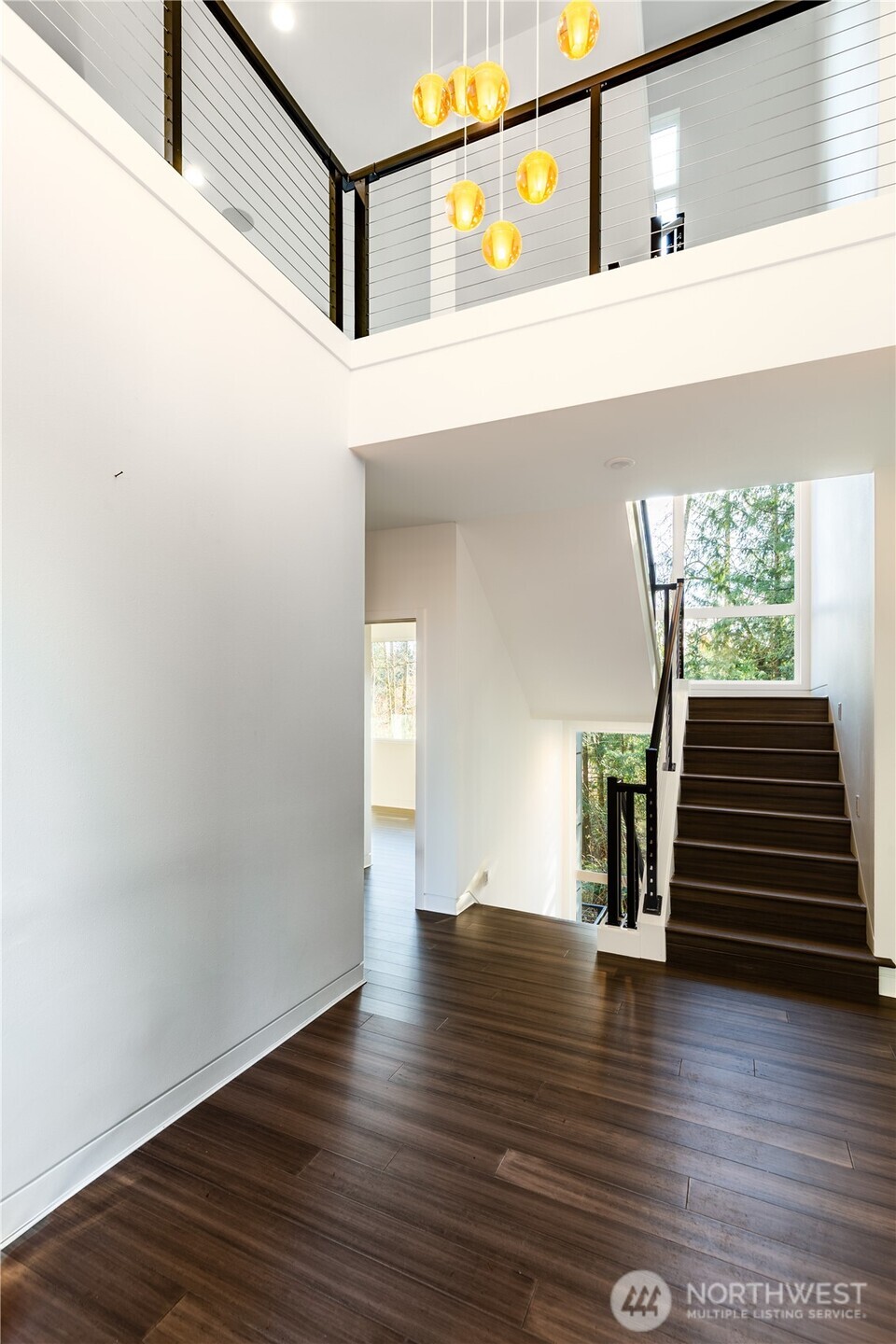 31535 Northeast 114th Street Carnation, WA 98014 - Photo 33 of 33 a view of entryway and hall with wooden floor