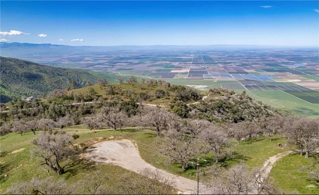 a view of a yard with an ocean