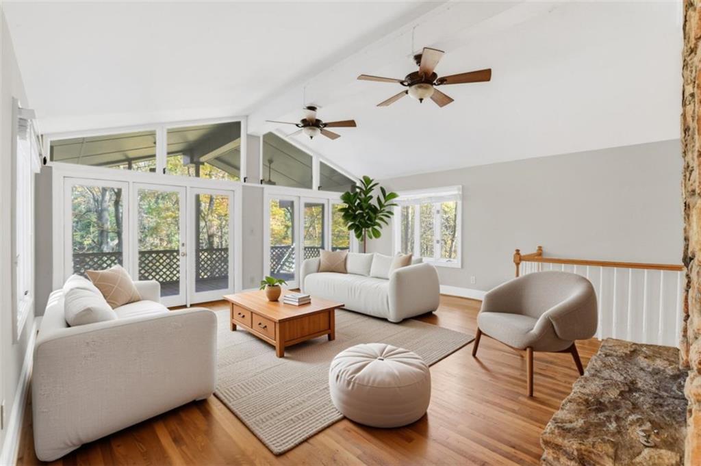 3959 Randall Mill Road Northwest Atlanta, GA 30327 - Photo 2 of 31 a living room with furniture and a large window