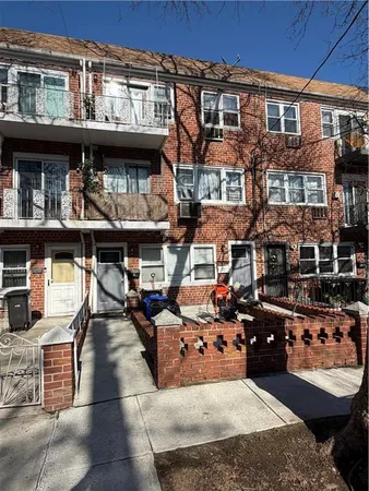 a view of multiple house with outdoor seating