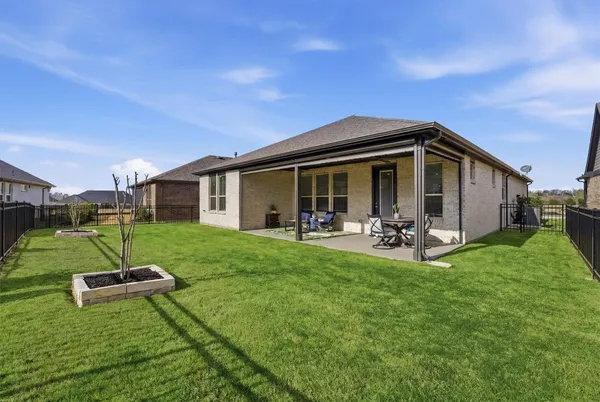 a view of a garden with a small yard