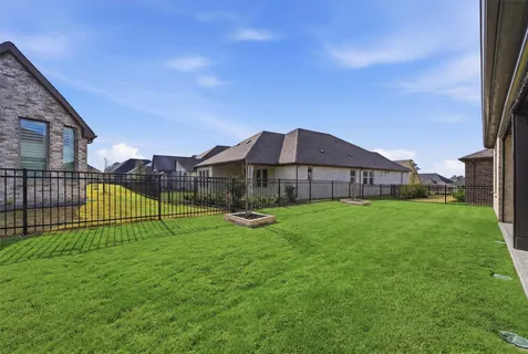 a house view with a garden space