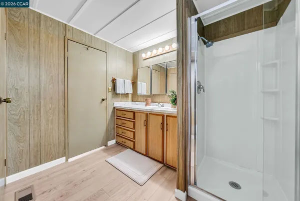 a patio with a table and chairs