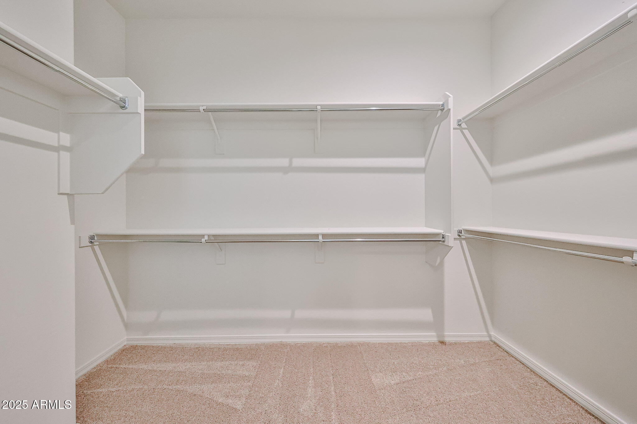 25079 North 171st Avenue Surprise, AZ 85387 - Photo 13 of 22 a view of an empty walk in closet