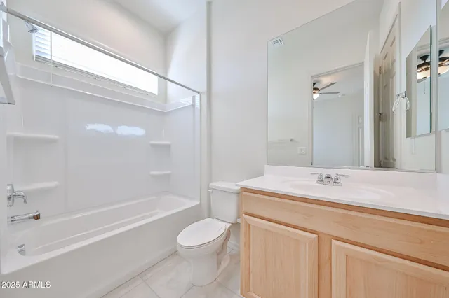 a bathroom with a sink a toilet and a bathtub