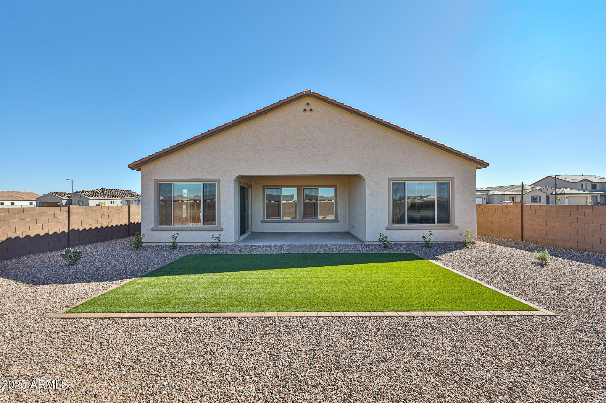 25079 North 171st Avenue Surprise, AZ 85387 - Photo 22 of 22 a view of a house with a yard and a patio