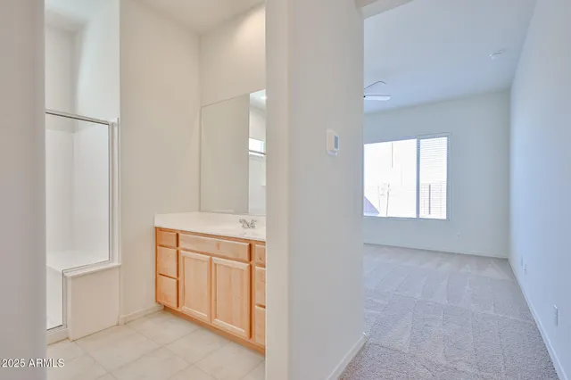 a view of an empty room and window