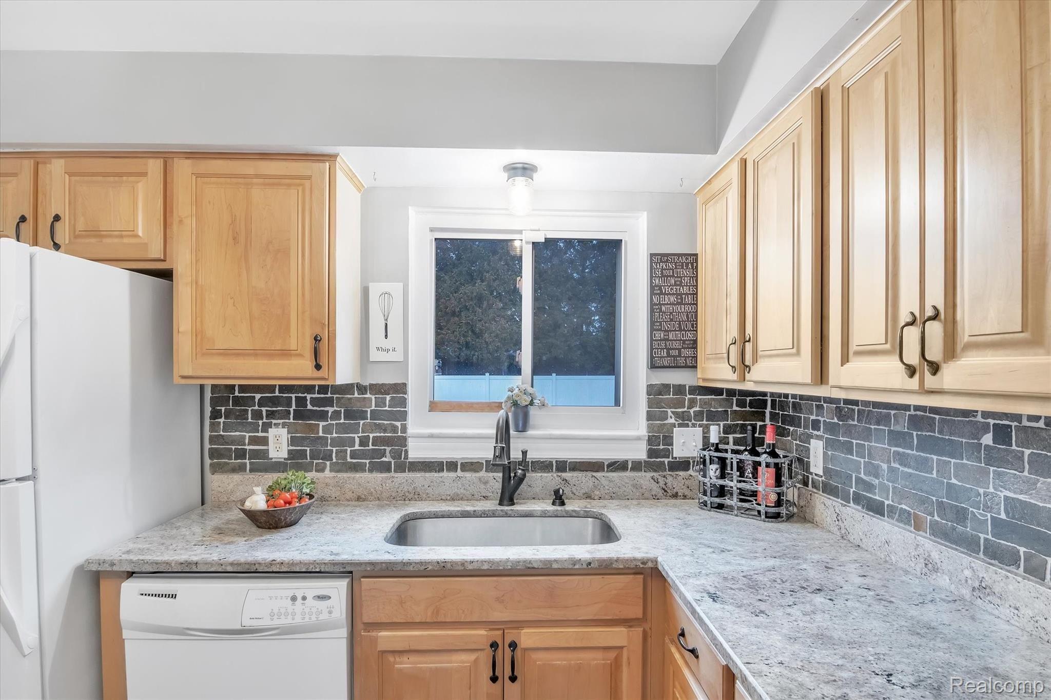 6344 Raintree Drive Canton, MI 48187 - Photo 13 of 38 Updated backsplash & granite countertops