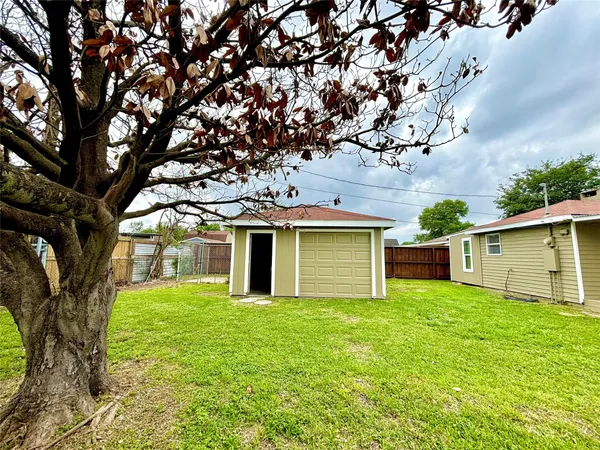 a front view of a house with yard