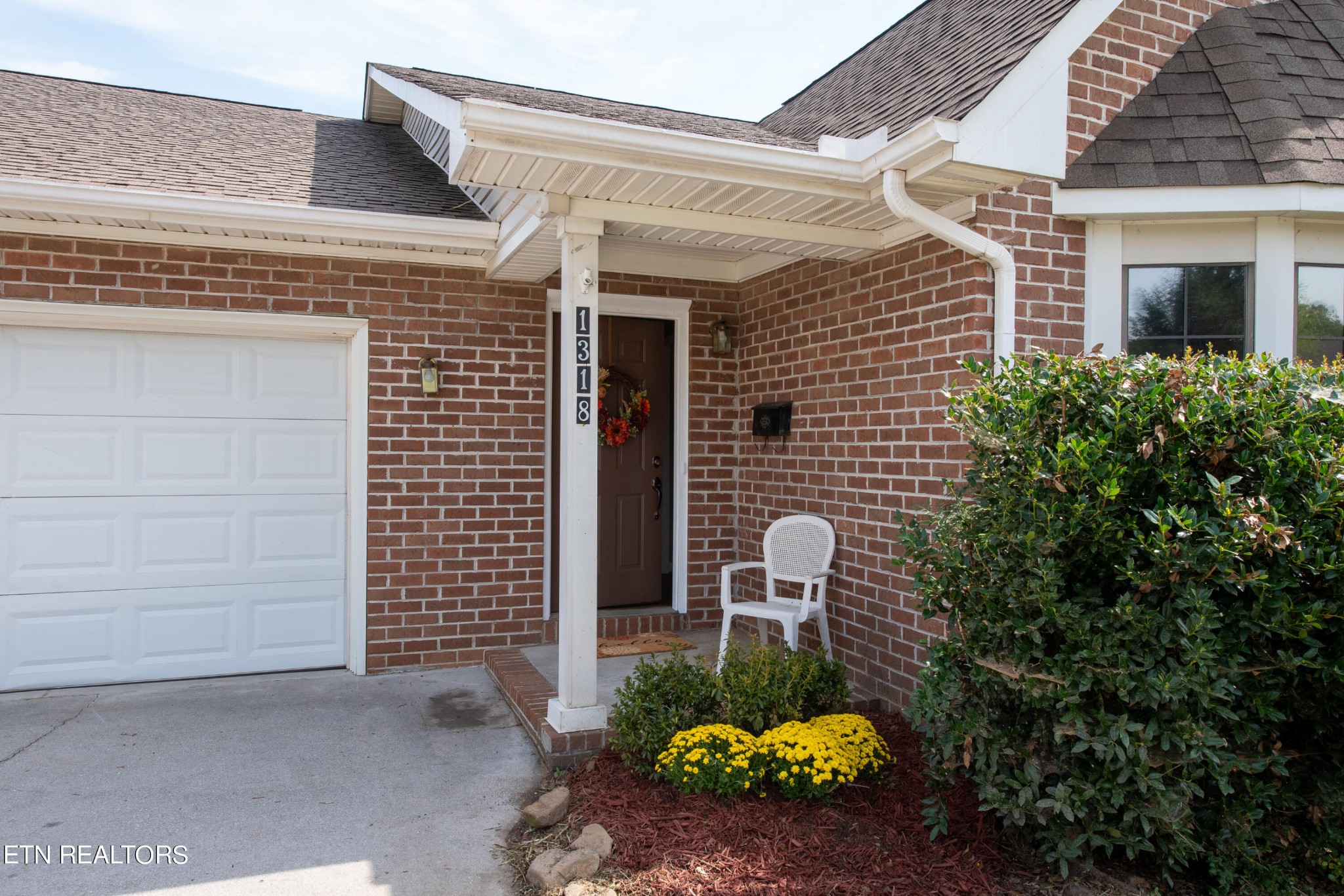 1318 Raulston Road Maryville, TN 37803 - Photo 2 of 28 a front view of a house with garden