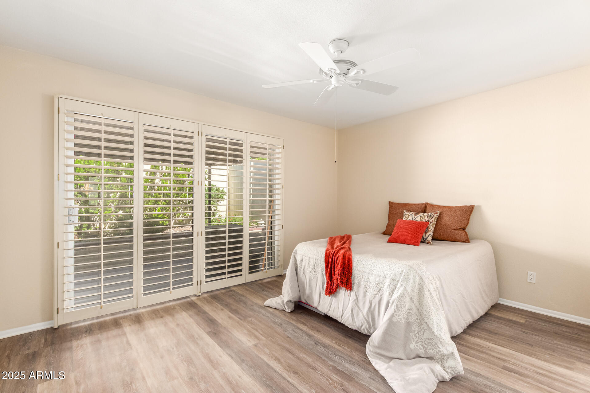 6735 North 16th Place Phoenix, AZ 85016 - Photo 15 of 28 a bedroom with a bed and a window