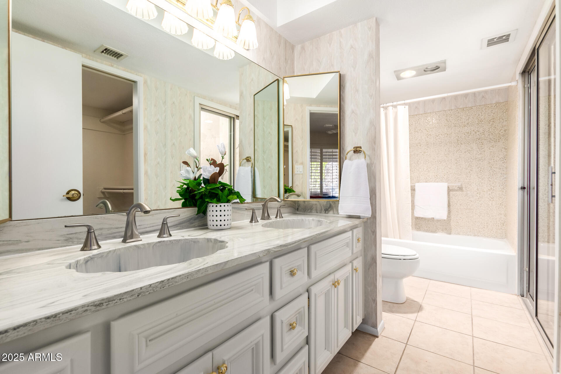 6735 North 16th Place Phoenix, AZ 85016 - Photo 18 of 28 a bathroom with a granite countertop sink mirror and a
