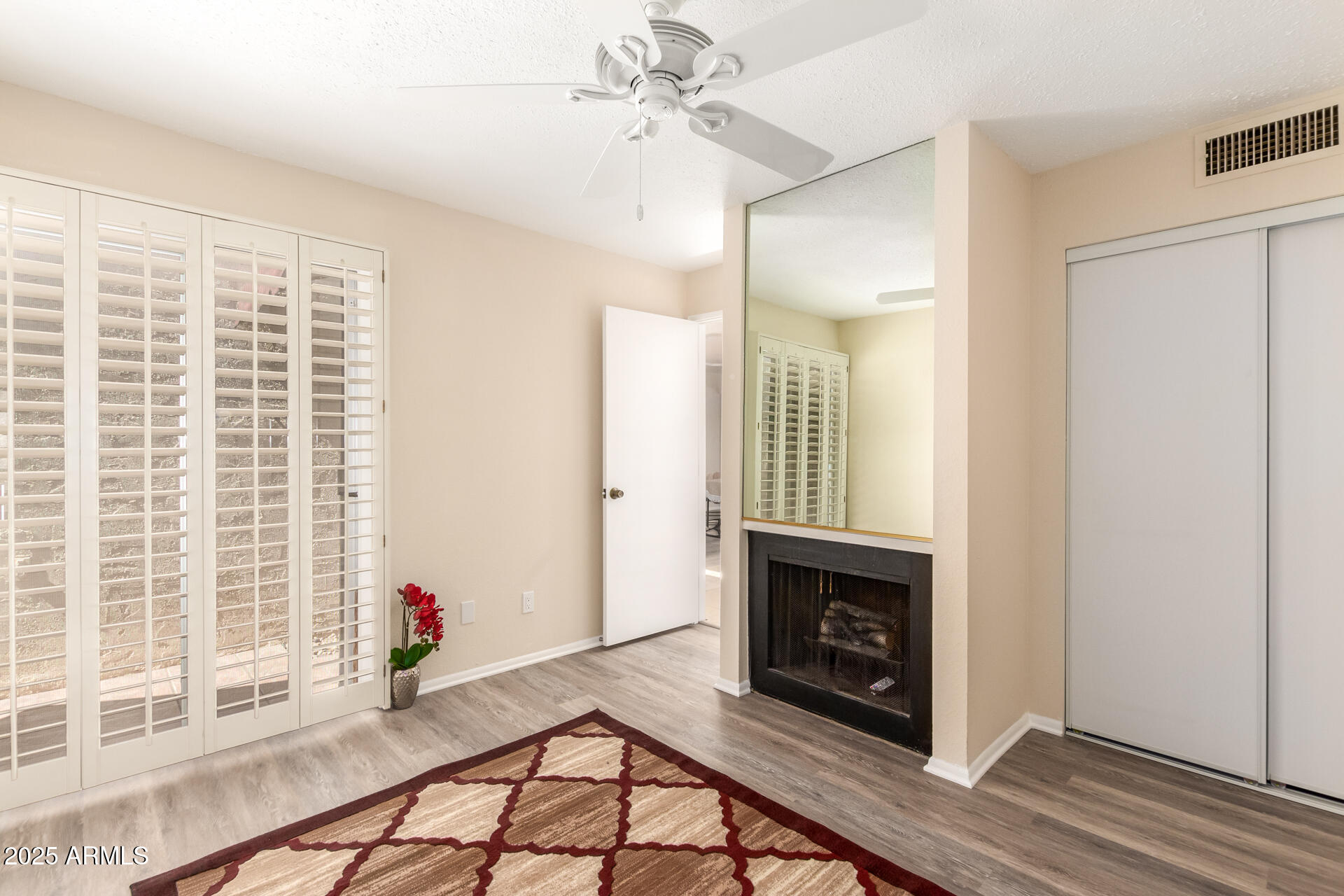 6735 North 16th Place Phoenix, AZ 85016 - Photo 19 of 28 a view of livingroom with furniture and a fireplace