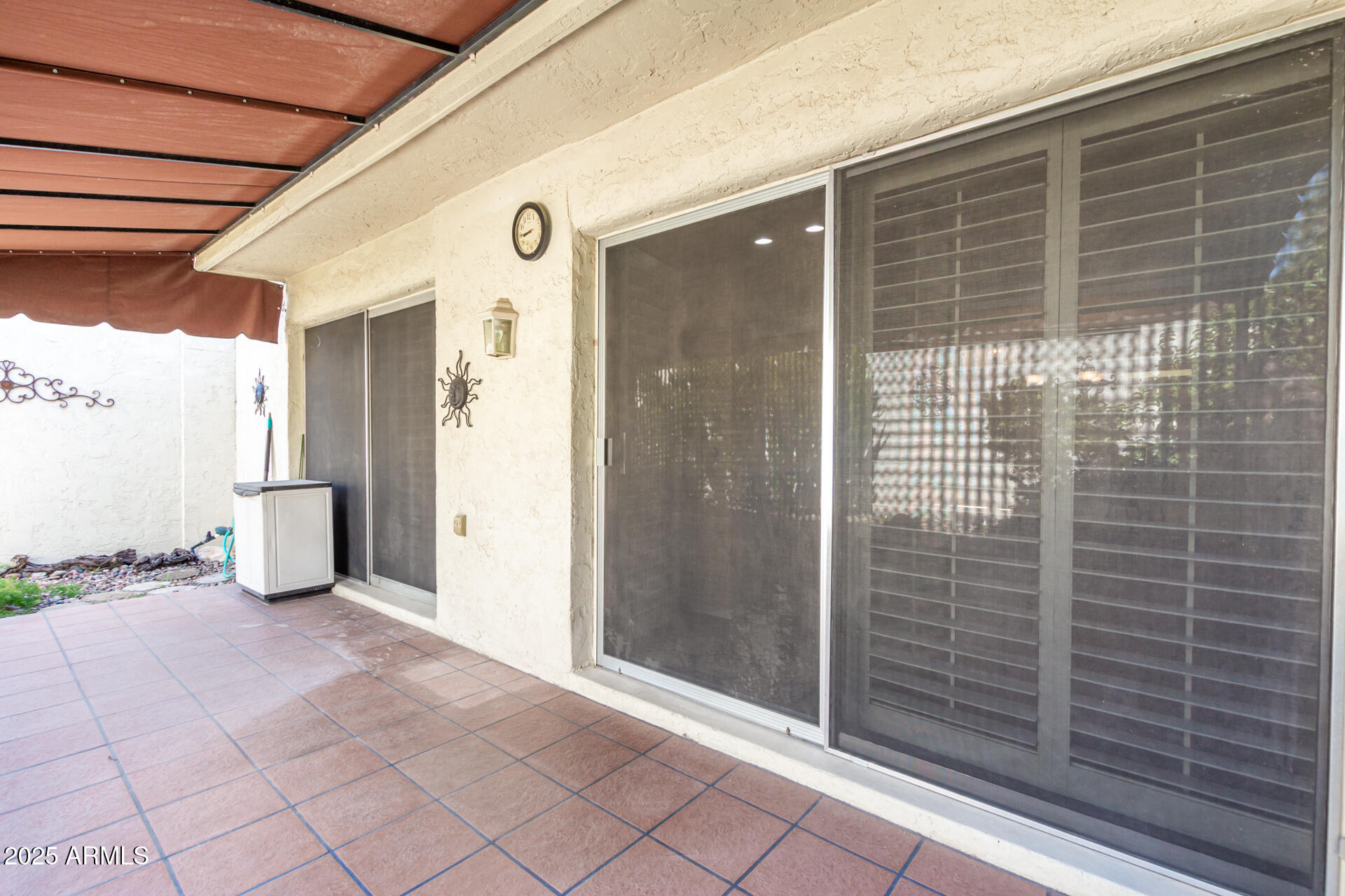 6735 North 16th Place Phoenix, AZ 85016 - Photo 22 of 28 a view of a porch with wooden floor
