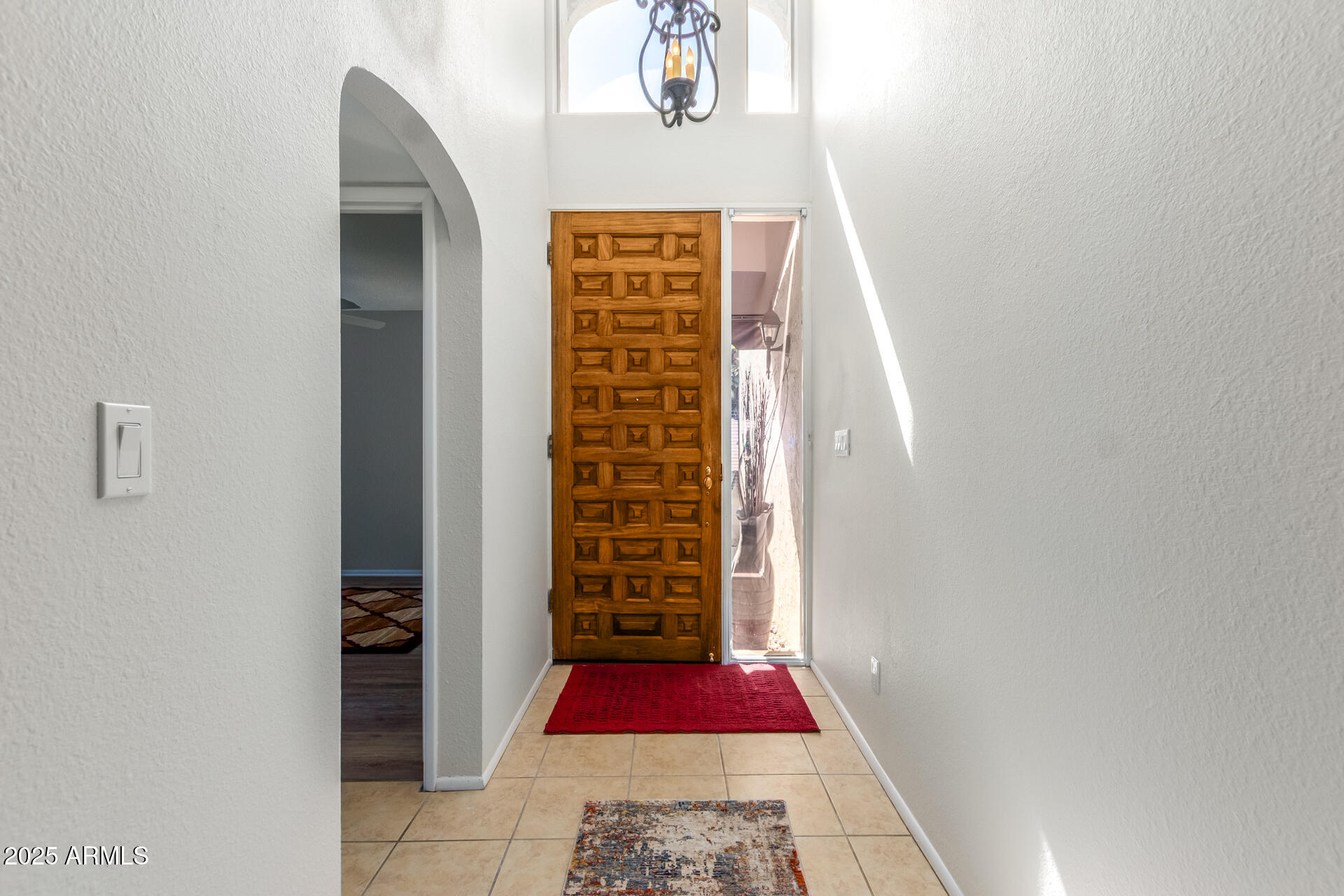 6735 North 16th Place Phoenix, AZ 85016 - Photo 24 of 28 a view of an entryway with wooden floor