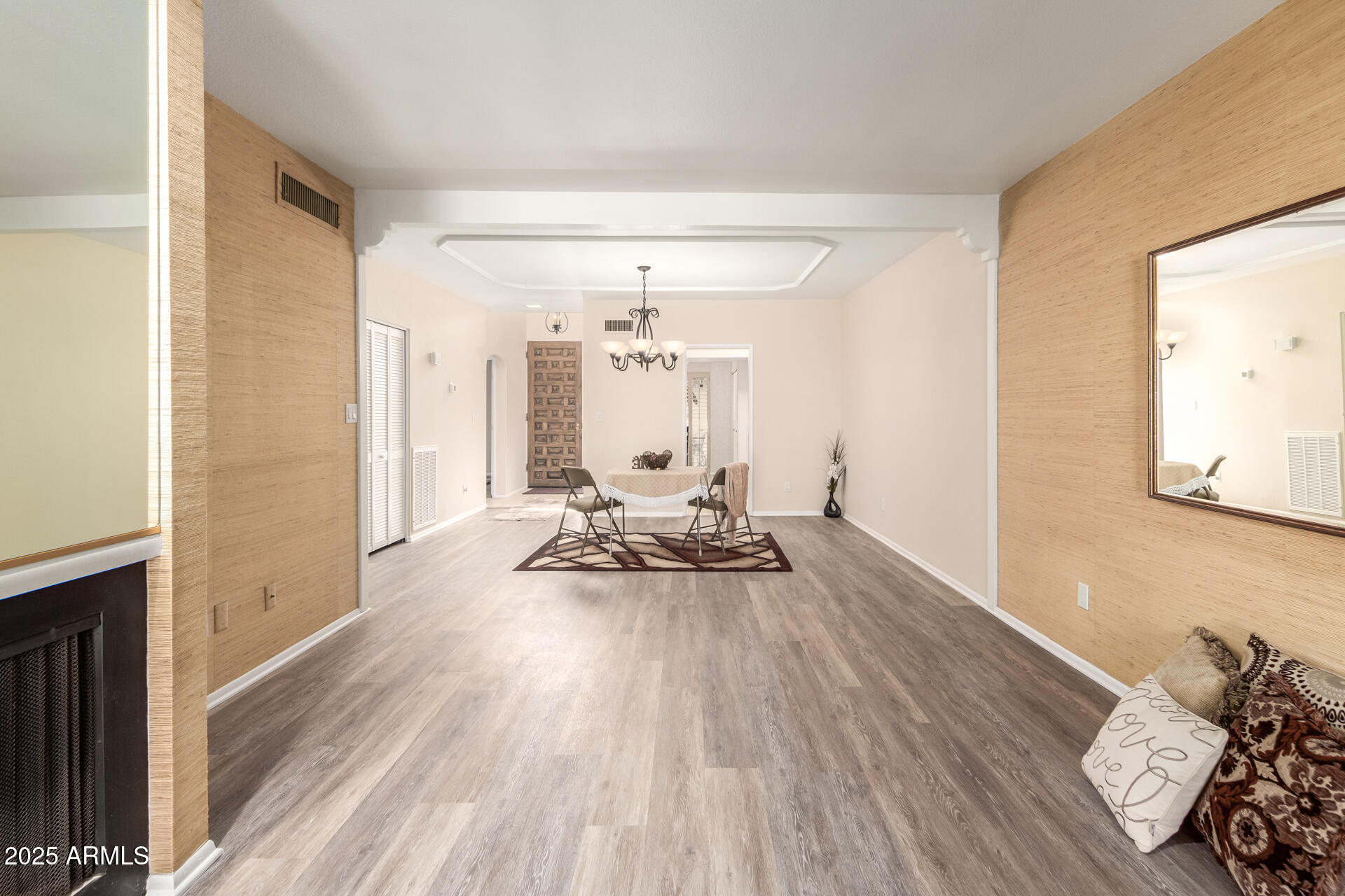 6735 North 16th Place Phoenix, AZ 85016 - Photo 6 of 28 a view of a room with wooden floor and furniture