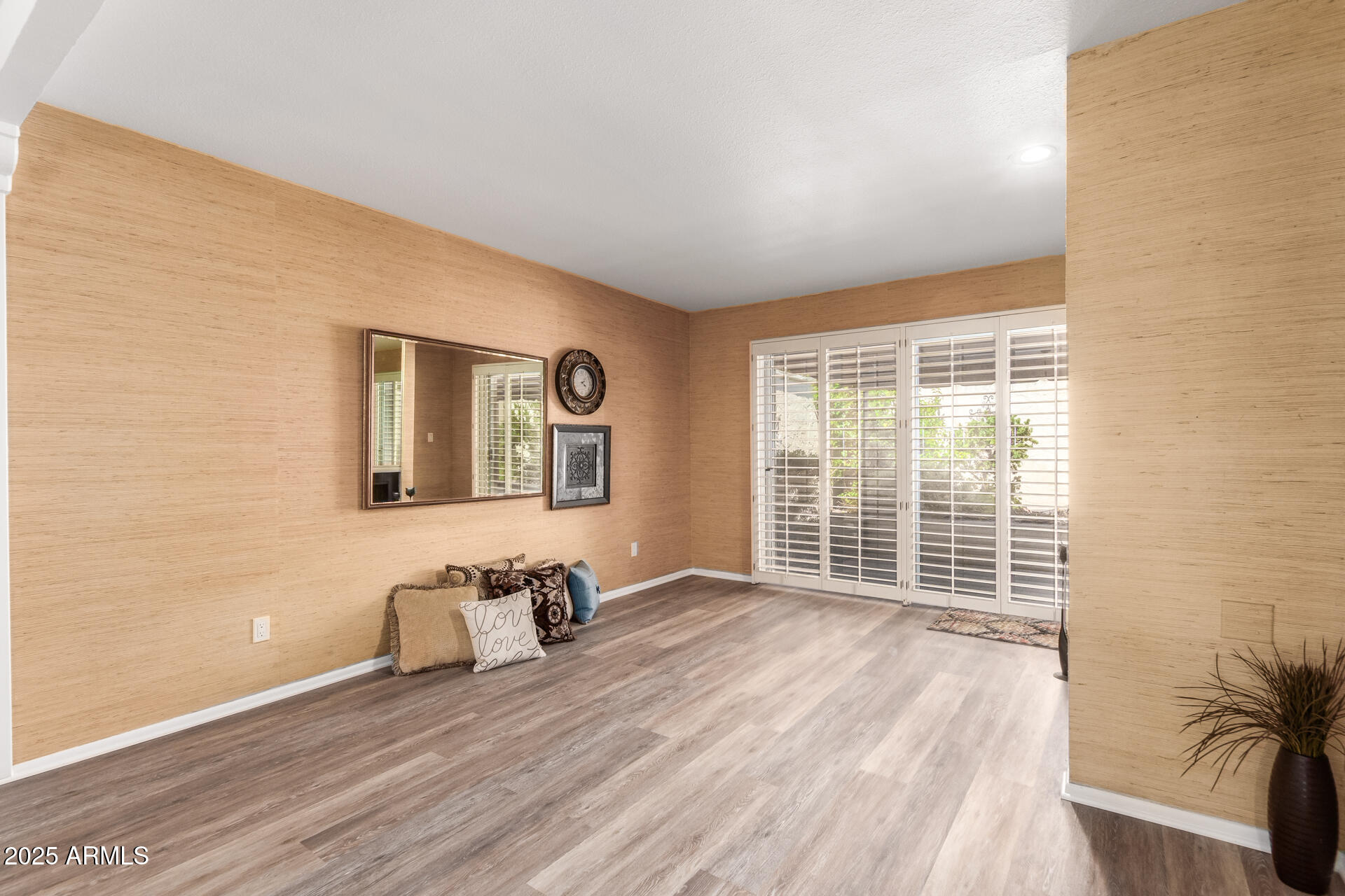 6735 North 16th Place Phoenix, AZ 85016 - Photo 8 of 28 a view of a livingroom with a large window