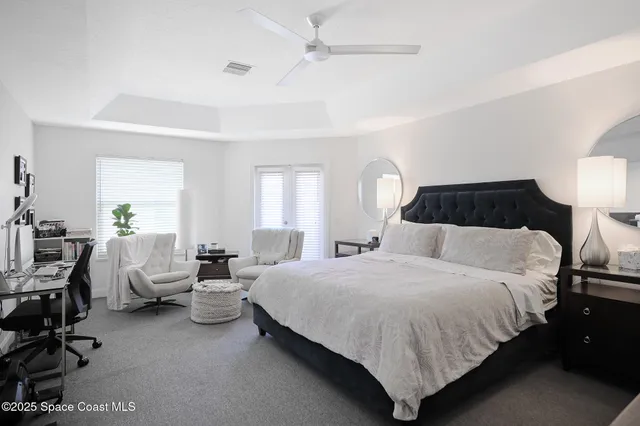 a bedroom with a bed and furniture