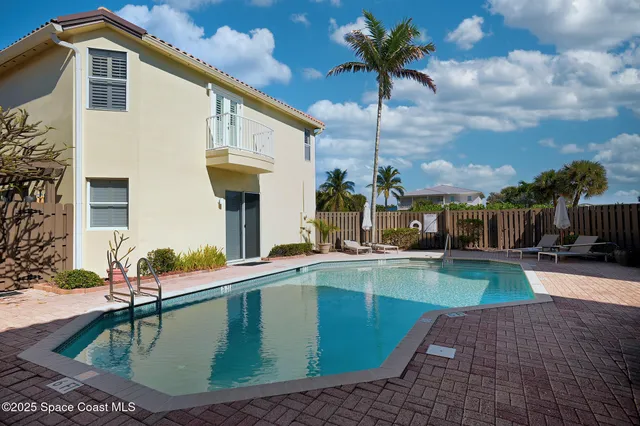 a view of a house with swimming pool