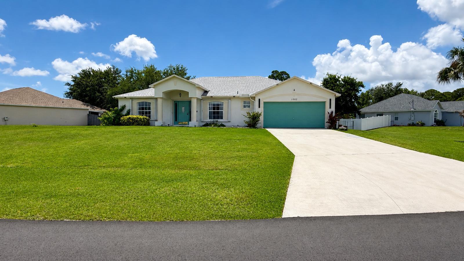 1002 Southwest Longfellow Road Port St. Lucie, FL 34953 - Photo 1 of 26 WhatsApp Image 2026-05-29 at 7.58.10 PM