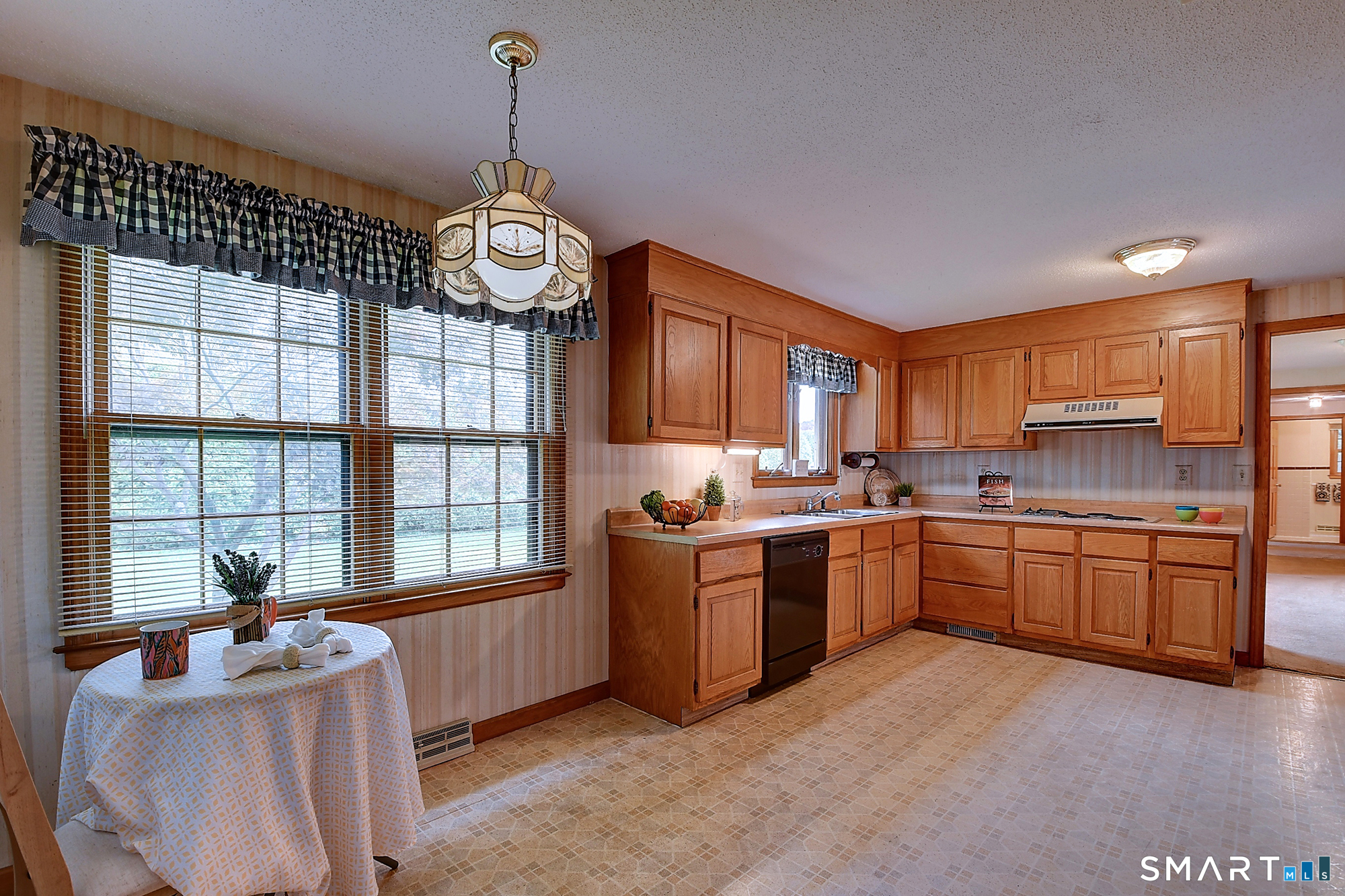 80 Grist Mill Road Wethersfield, CT 06109 - Photo 18 of 40 a kitchen with stove and cabinets