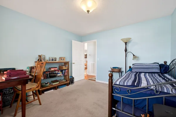 a room with furniture and a chandelier