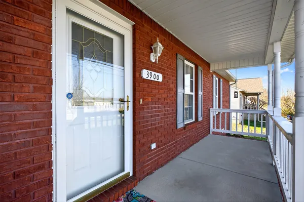 a view of a brick house with a hallway