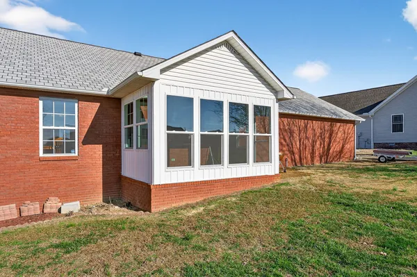 a view of a house with a garden