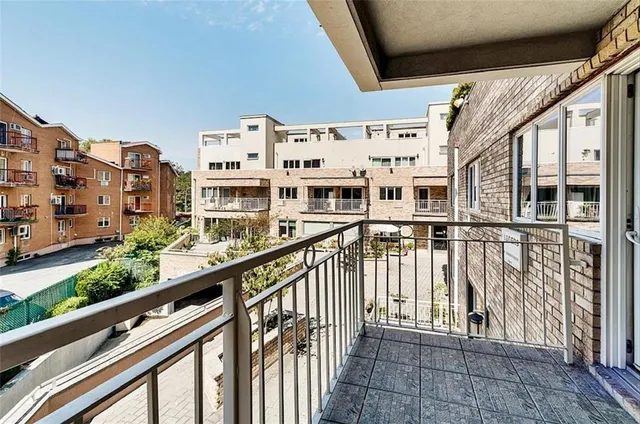 a view of balcony with furniture