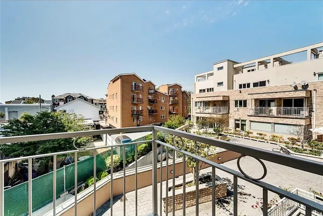 a view of a balcony with chairs