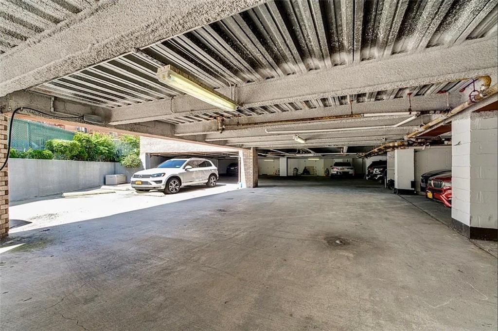 2900 East 29th Street, Unit 2E Brooklyn, NY 11235 - Photo 16 of 17 a car parked in parking