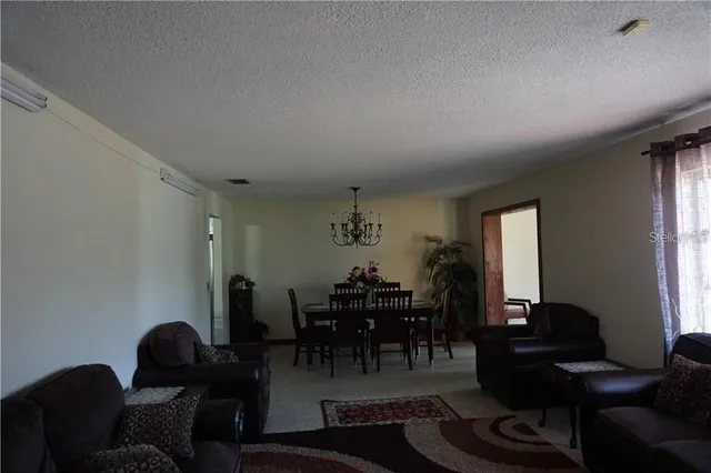a workspace with furniture window and wooden floor