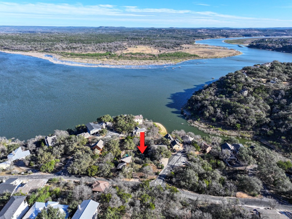 103 Center Cove II Loop Spicewood, TX 78669 - Photo 2 of 9 a view of an ocean and a mountain