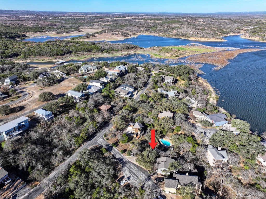 103 Center Cove II Loop Spicewood, TX 78669 - Photo 8 of 9 an aerial view of residential houses with outdoor space
