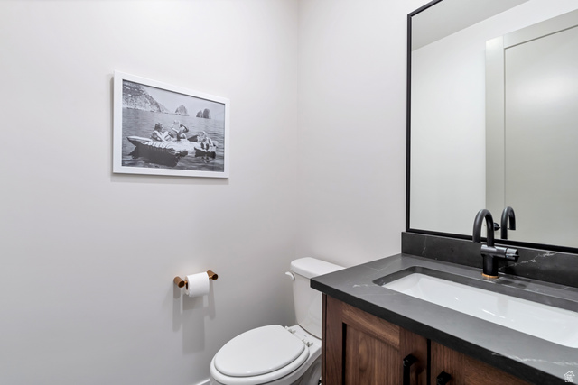 2145 North Main Street Centerville, UT 84014 - Photo 23 of 53 Half bathroom with vanity and toilet
