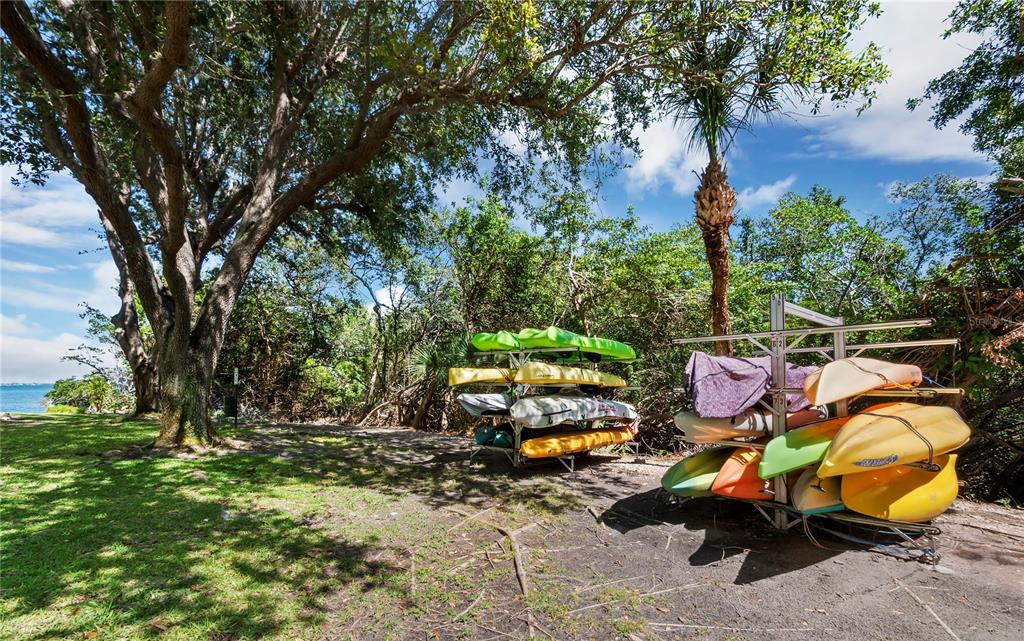 600 Sutton Place, Unit 104B Longboat Key, FL 34228 - Photo 40 of 53 a childrens park with lots of swings and slides