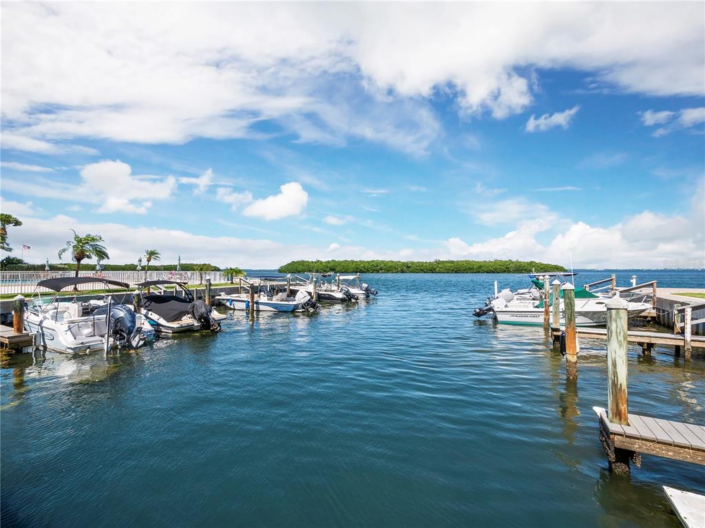 600 Sutton Place, Unit 104B Longboat Key, FL 34228 - Photo 4 of 53 a view of an ocean with boats