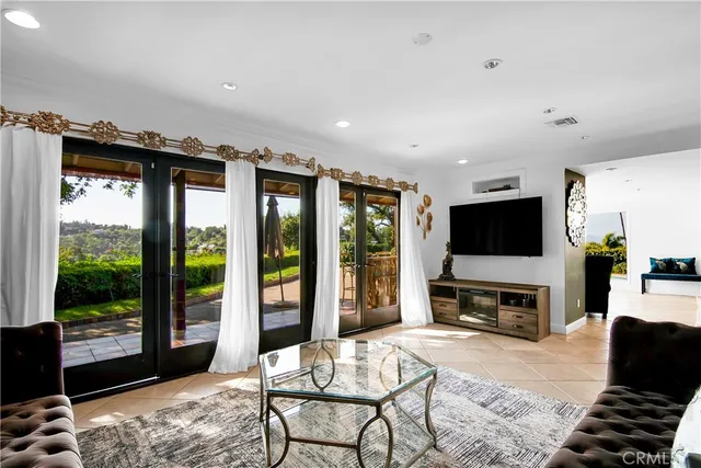a living room with a rug