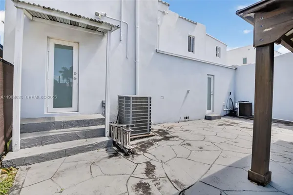 a front view of house with yard and entertaining space