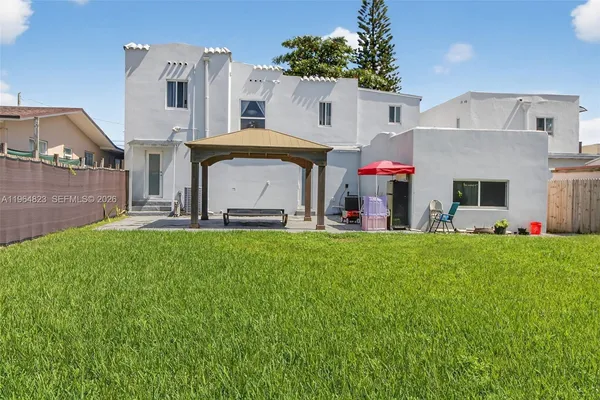 a living room with a couch and a gate