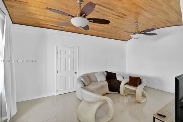 a bedroom with a bed and a table