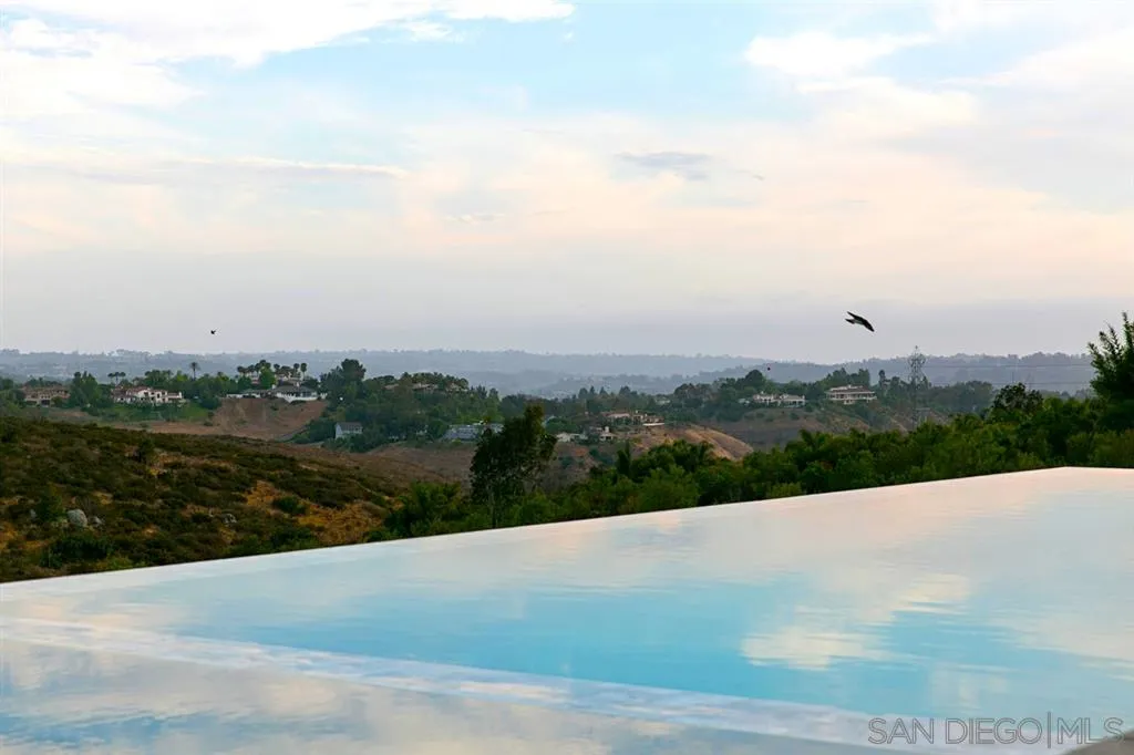16582 Rio Vista Road San Diego, CA 92127 - Photo 17 of 20 a view of a lake with a city view