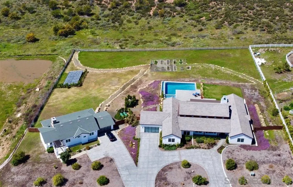 16582 Rio Vista Road San Diego, CA 92127 - Photo 19 of 20 an aerial view of residential houses with outdoor space and lake view