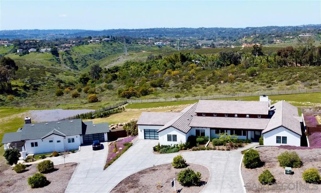 16582 Rio Vista Road San Diego, CA 92127 - Photo 20 of 20 an aerial view of a house with an outdoor space and seating