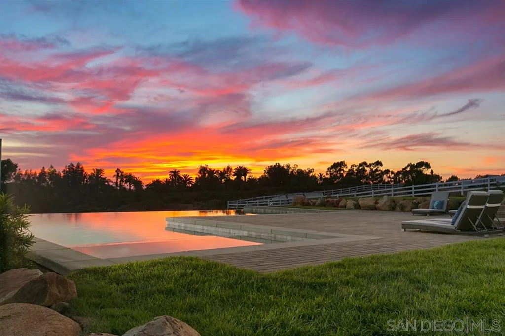 16582 Rio Vista Road San Diego, CA 92127 - Photo 5 of 20 a view of lake with outdoor seating