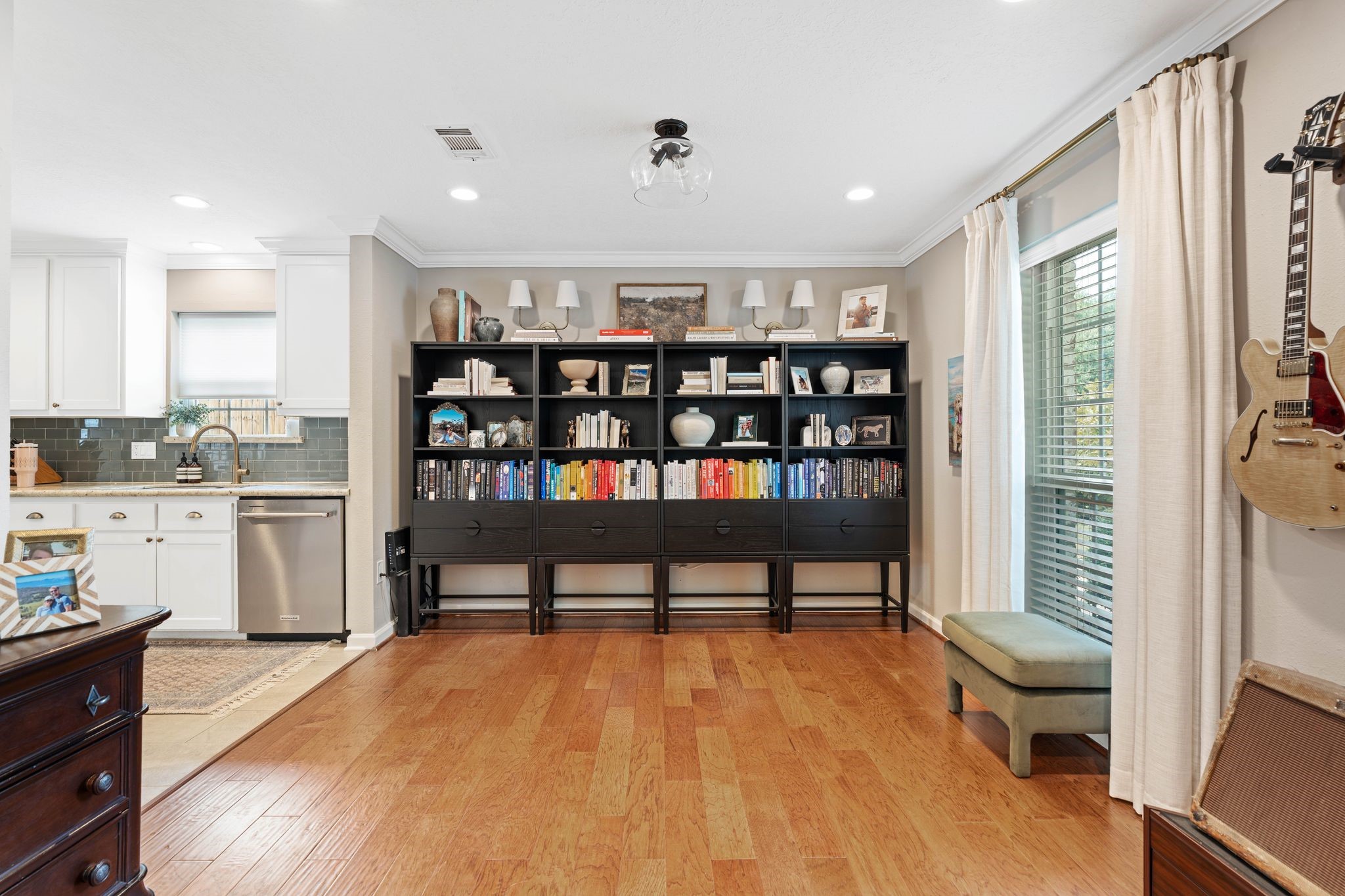 991 Curtin Street Houston, TX 77018 - Photo 13 of 39 The flex space off of the kitchen is ideal for a home office. This space could be left open or easily enclosed for additional privacy.