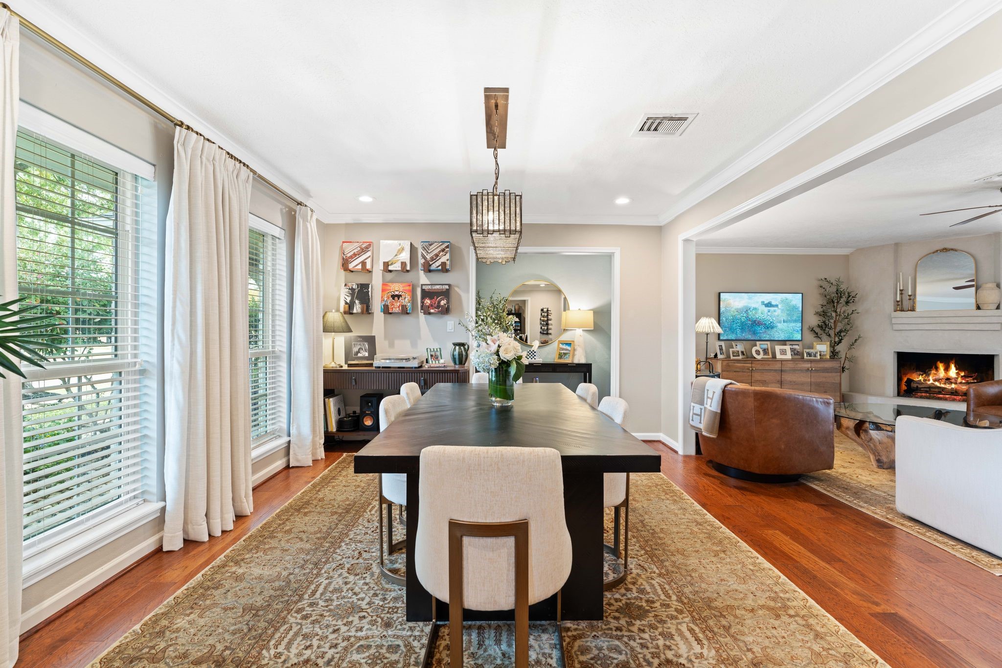 991 Curtin Street Houston, TX 77018 - Photo 5 of 39 The formal dining space is open to the living room through a wide cased opening.